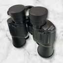 BINOCULARES ACERO DE PLASTICO 18*14CM COLOR NEGRO