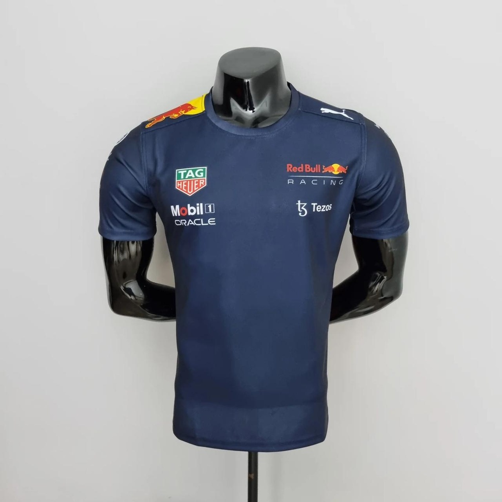 CAMISETA F1 CUELLO REDONDO MARCA PUMA COLOR AZUL MARINO LOGO DE TORO Y RED BULL ATRAS